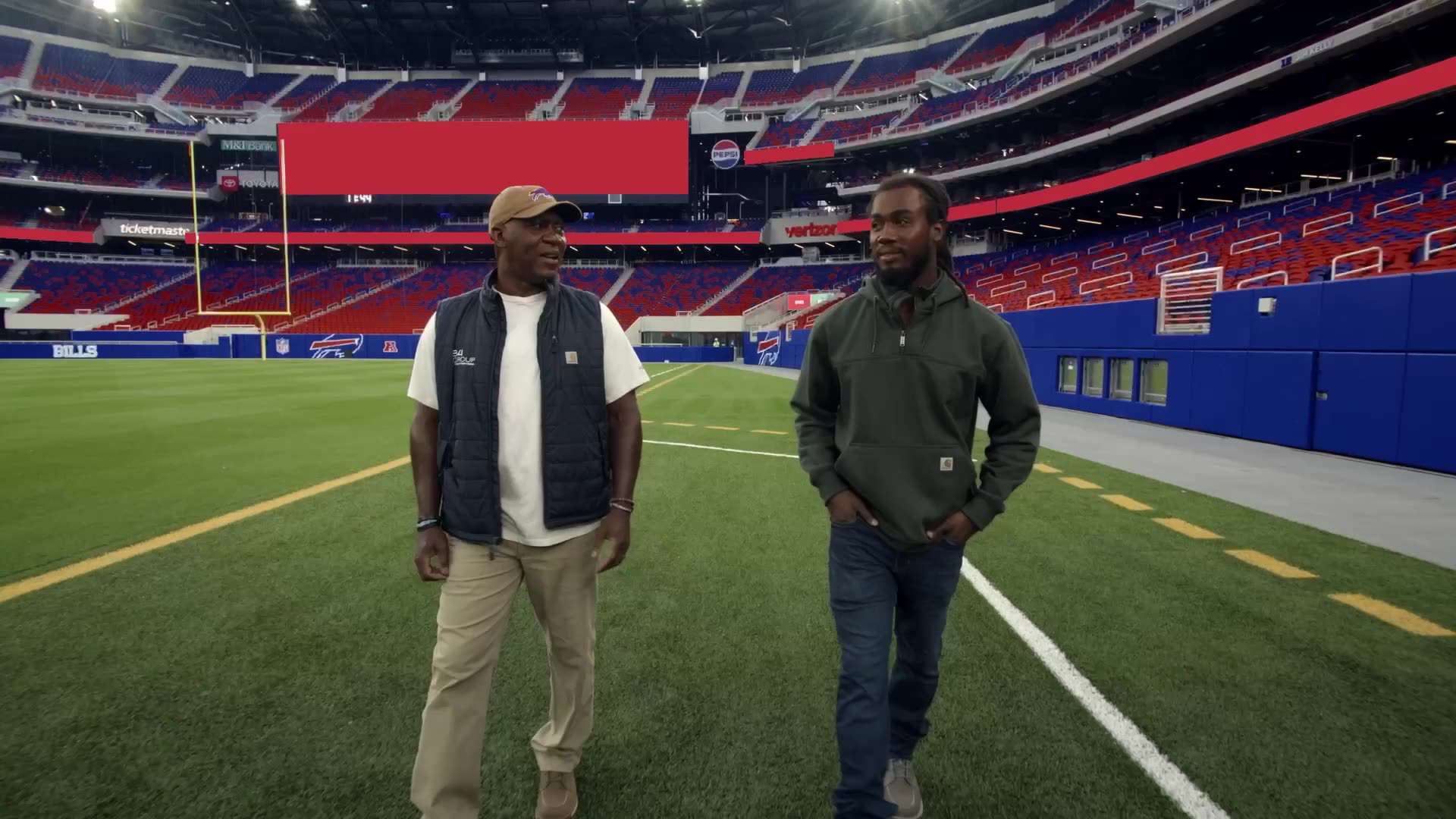 Thurman Thomas and James Cook III at Highmark Stadium in Carhartt’s Made Possible campaign